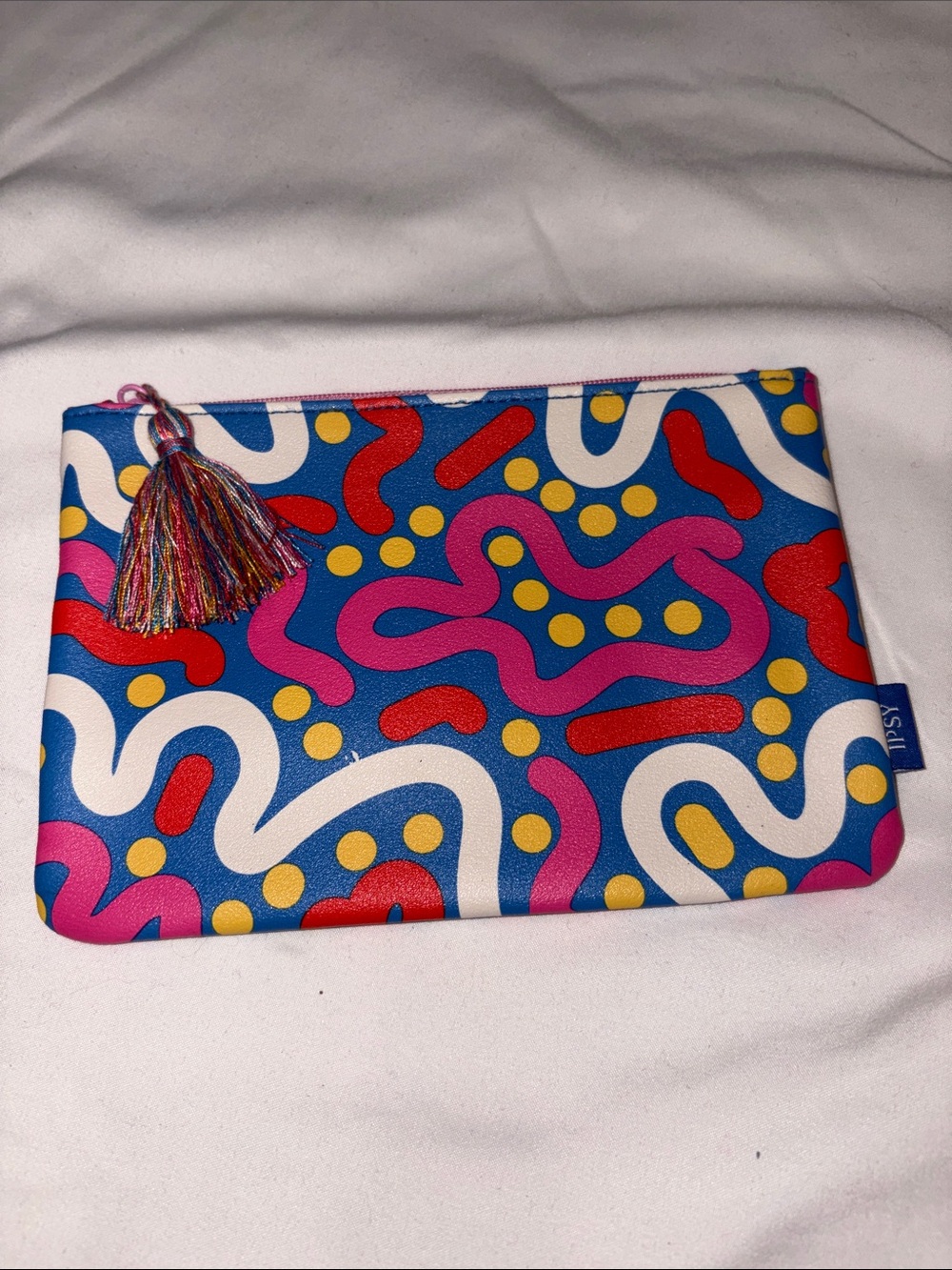 ipsy Colorful Abstract Tassel Cosmetic Bag - Blue, Pink, Red, Yellow, White